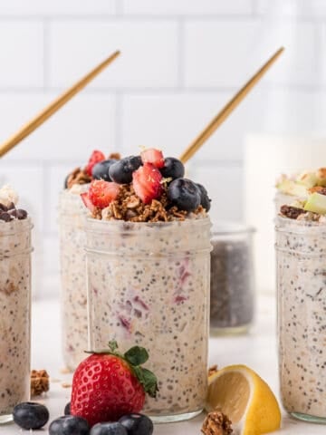 overnight oats three ways in mason jars with fruit toppings