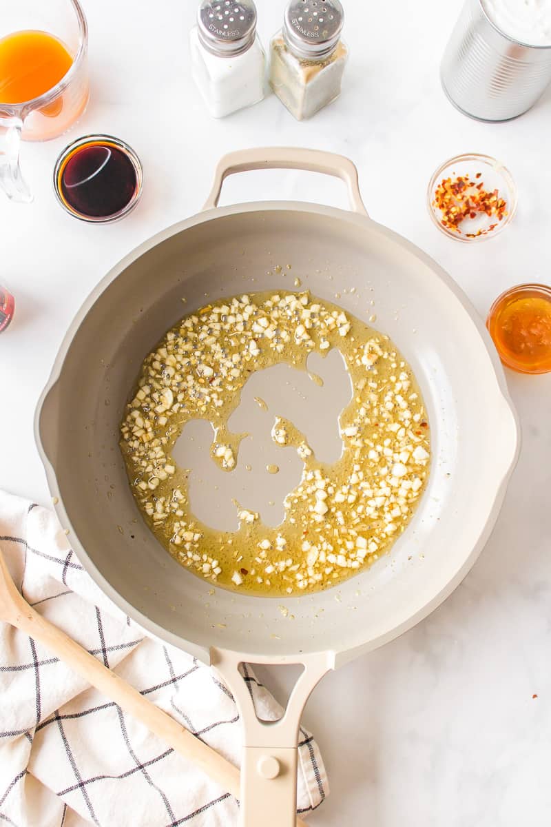 cooking aromatics for the curry rice noodles