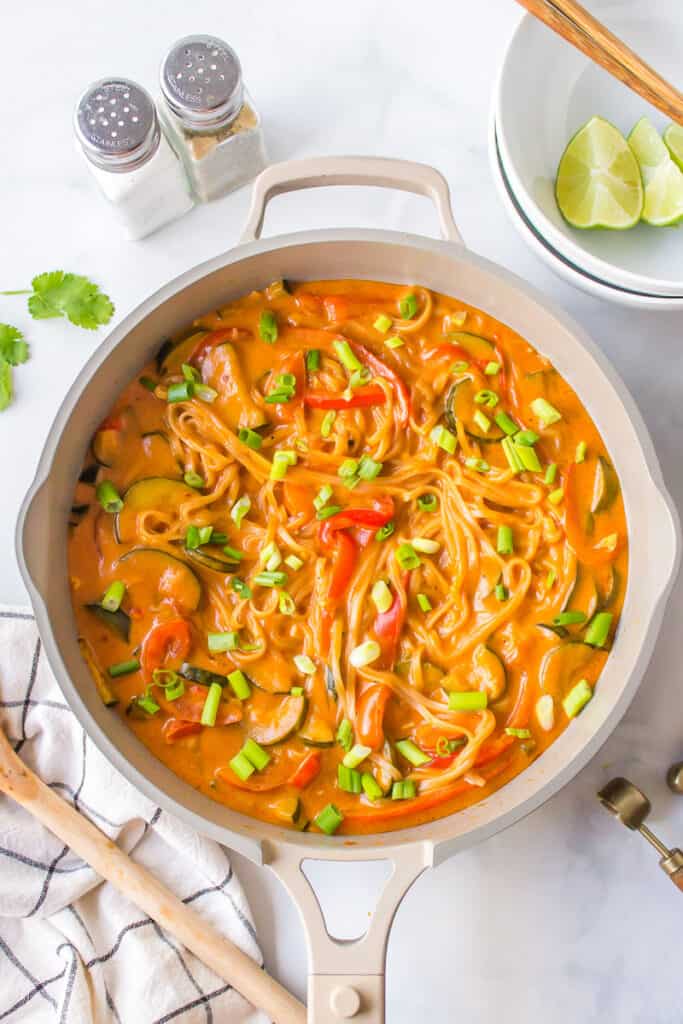 rice noodles with curry sauce in vegetables after sauting
