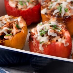 stuffed bell peppers close up in a pan after baking