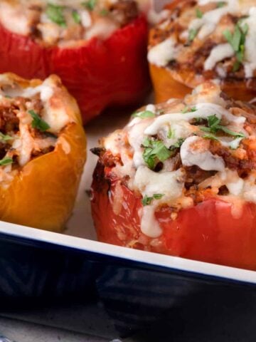 stuffed bell peppers close up in a pan after baking