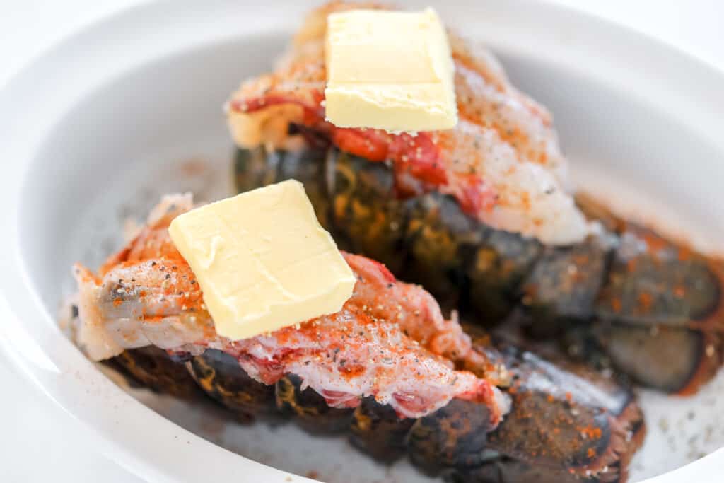 top the romantic lobster and steak dinner with pats of butter like compound butter