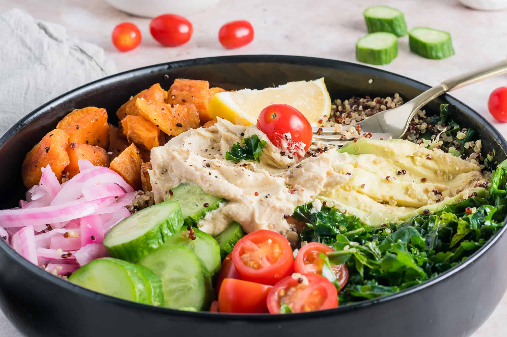 mediterranean bowl served with a fork.