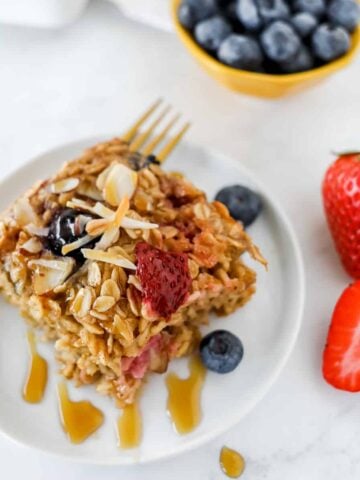 Dairy free baked oatmeal slice on a plate.