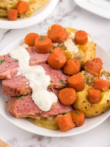 easy horseradish sauce poured on top of corned beef.