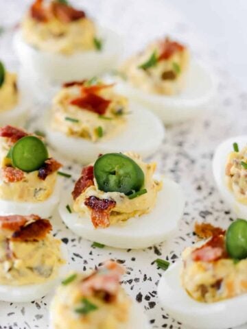 Bacon jalapeno deviled eggs ready to be served.