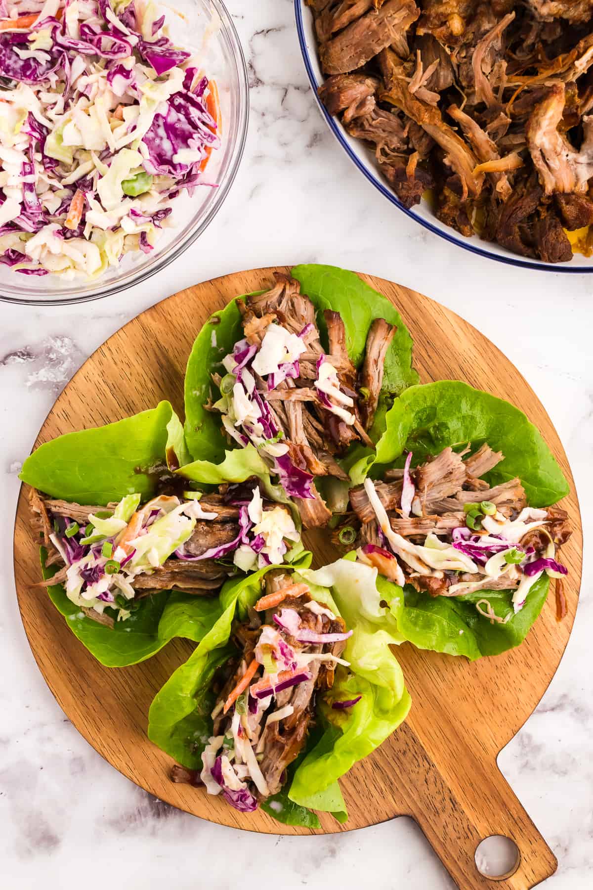 Prepped and served pulled pork lettuce wraps.