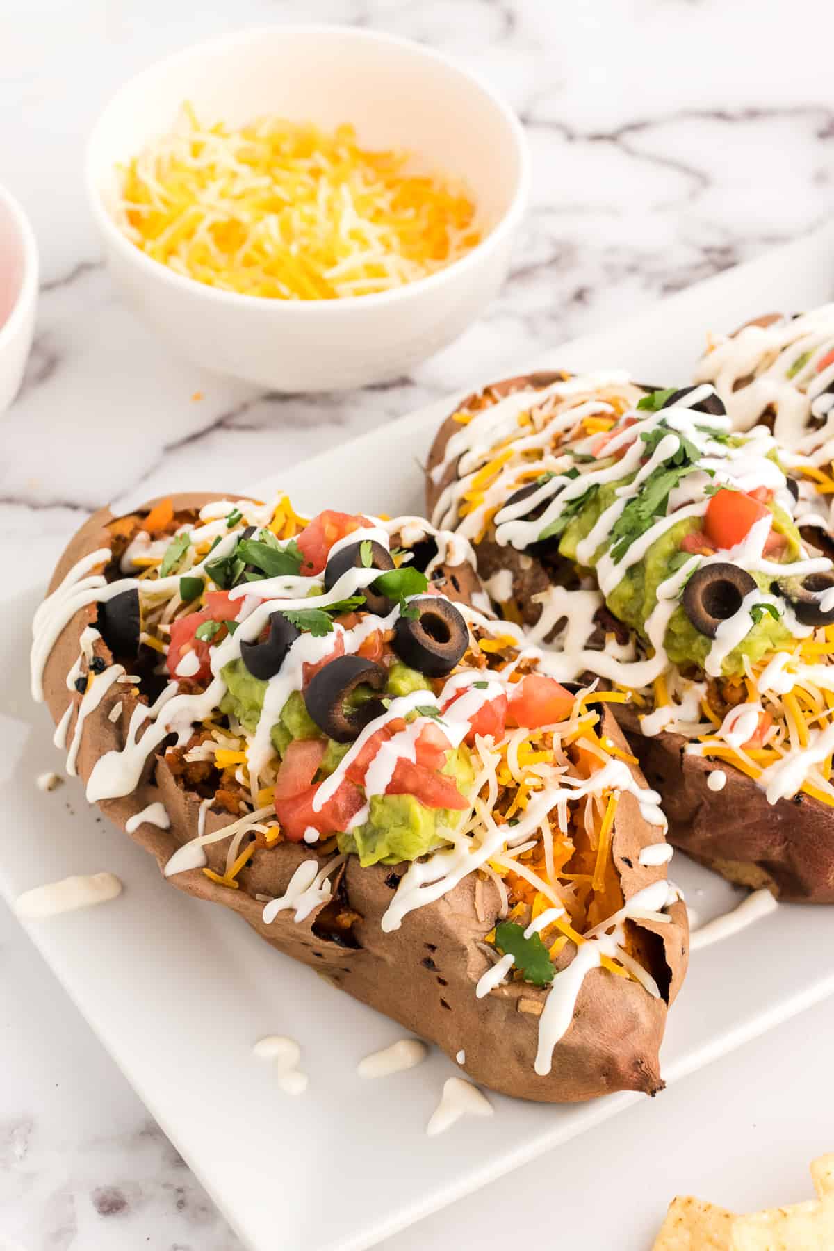Mexican stuffed sweet potatoes ready to serve on a plate.