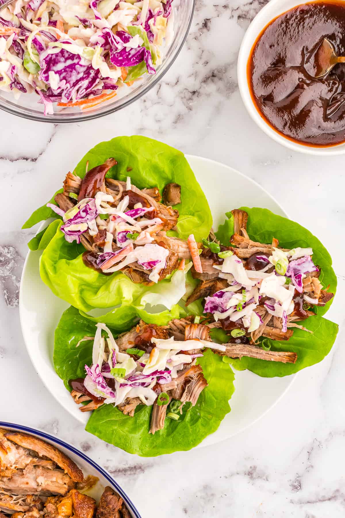 Prepped and served pulled pork lettuce wraps.