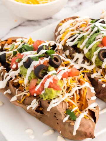 Mexican stuffed sweet potatoes ready to serve on a plate.