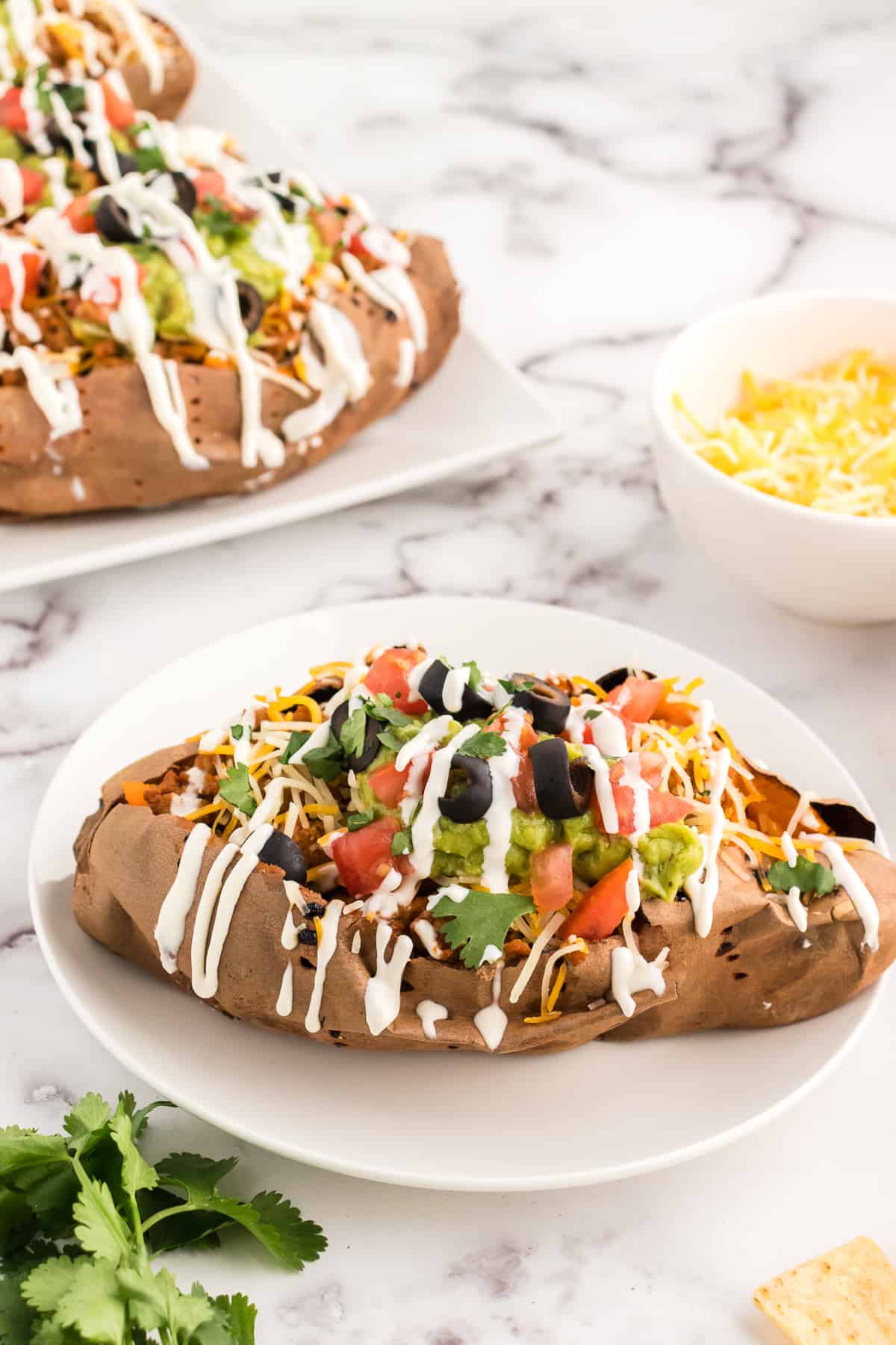 Mexican stuffed sweet potatoes ready to serve on a plate.