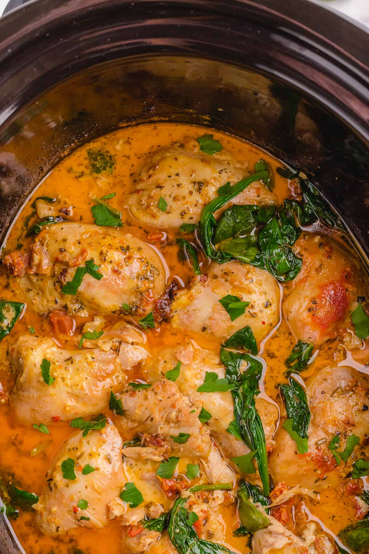 Finished Tuscan chicken still in the crock pot.