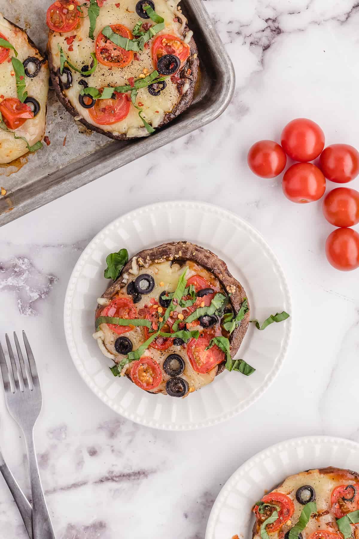 Serving a keto portobello mushroom on a plate.