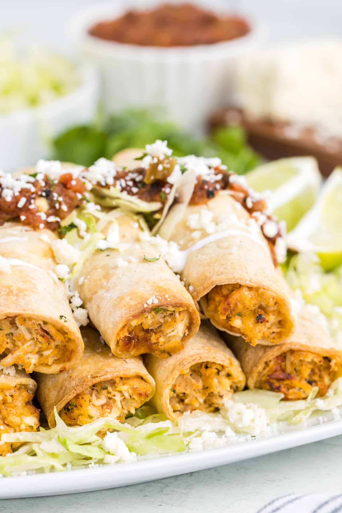 Platter of homemade air fryer chicken taquitos.