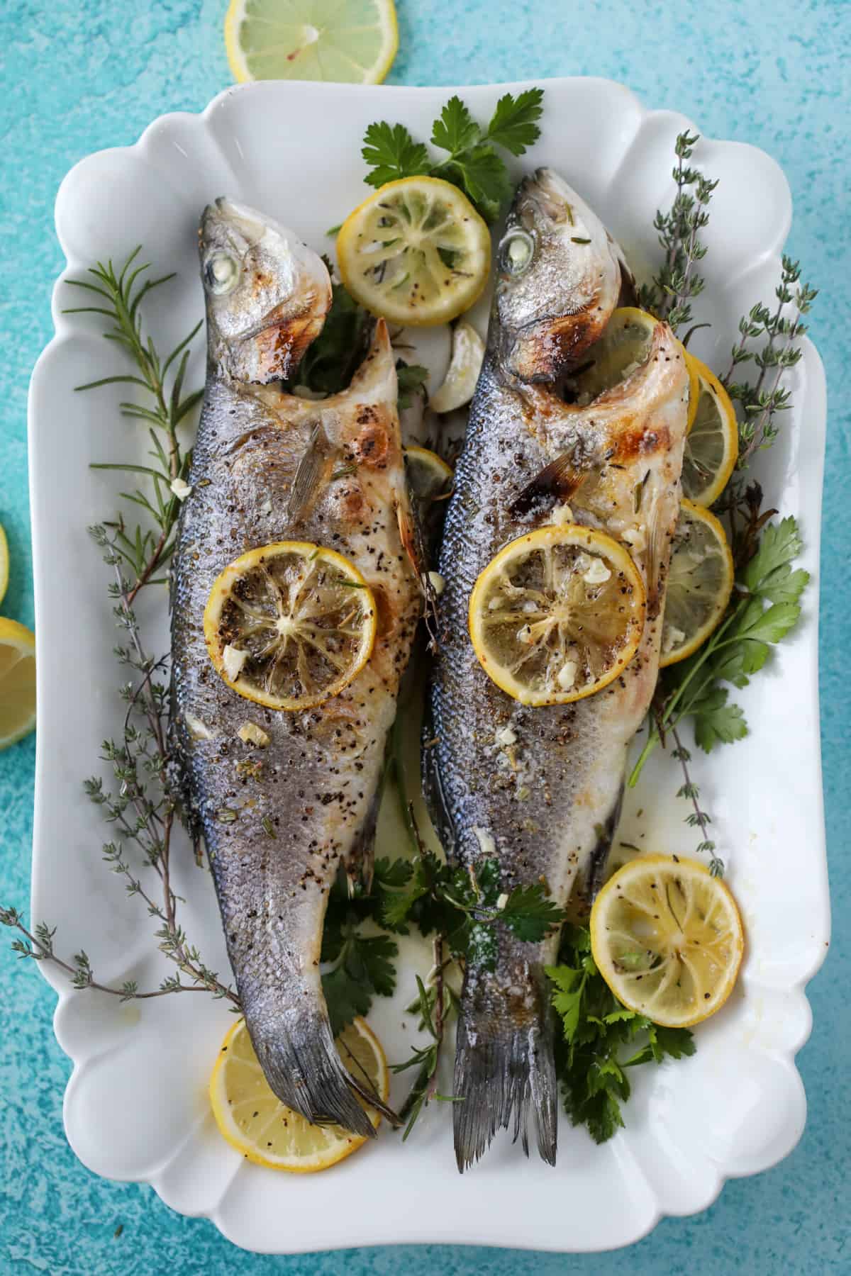 branzini fish topped with lemon 4
