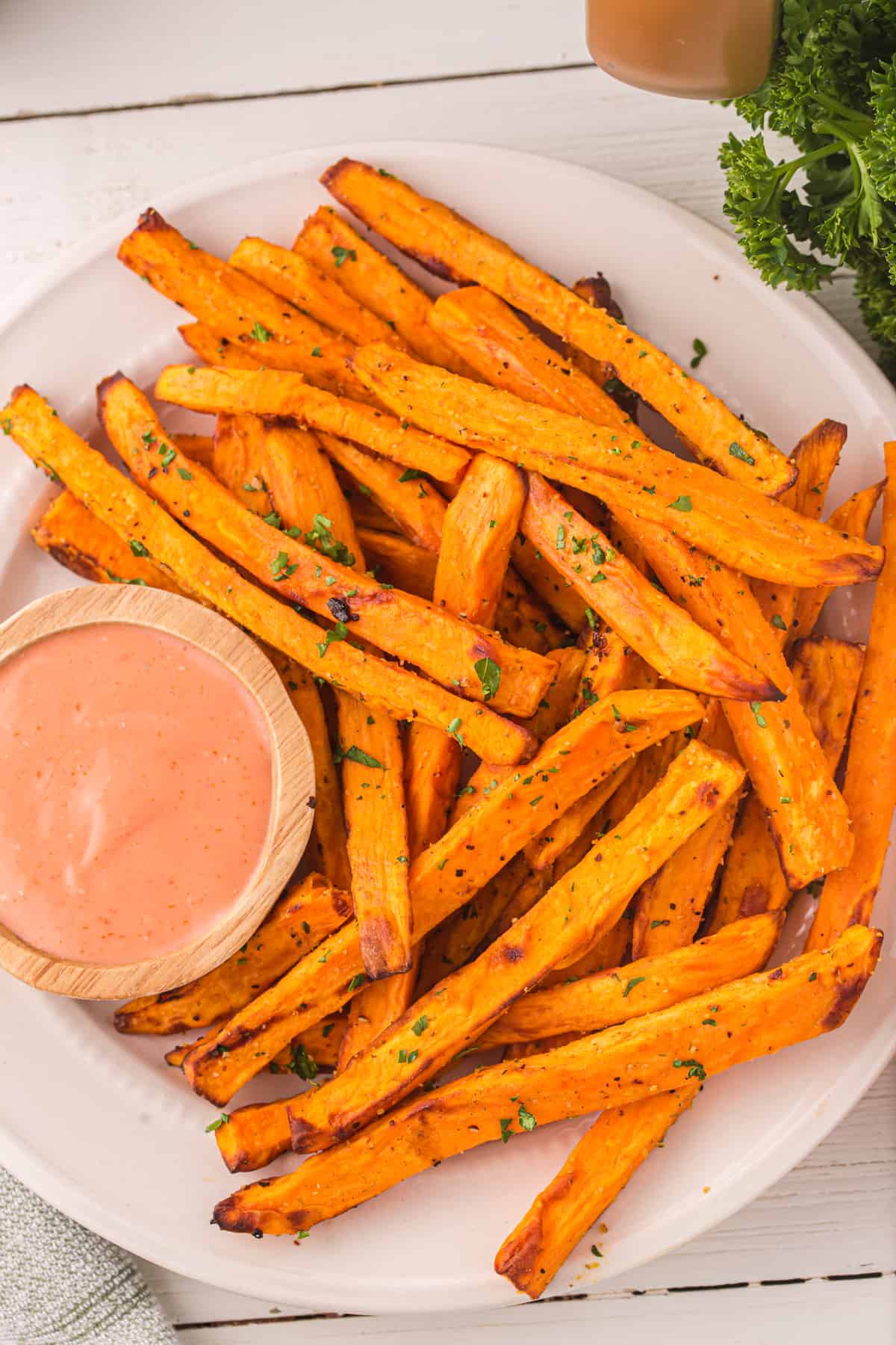 Plate of seasoned air fried sweet potatoes