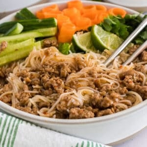 A freshly prepared pork bowl sorted by ingredient.