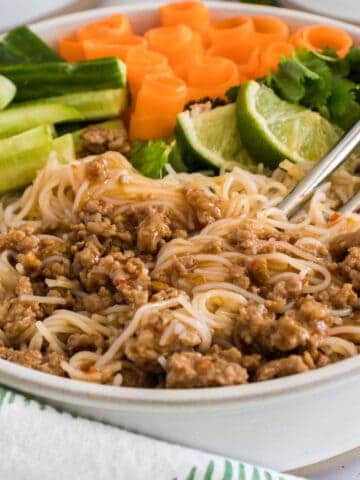 A freshly prepared pork bowl sorted by ingredient.