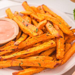 Plate of seasoned air fried sweet potatoes