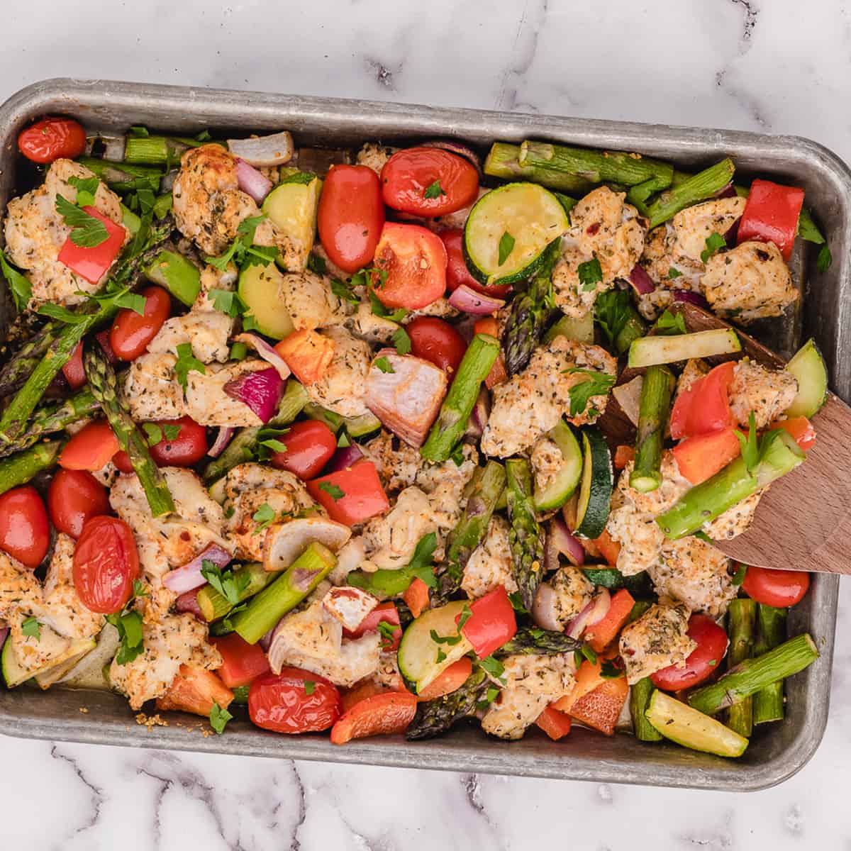 chicken and vegetables in a pan 6