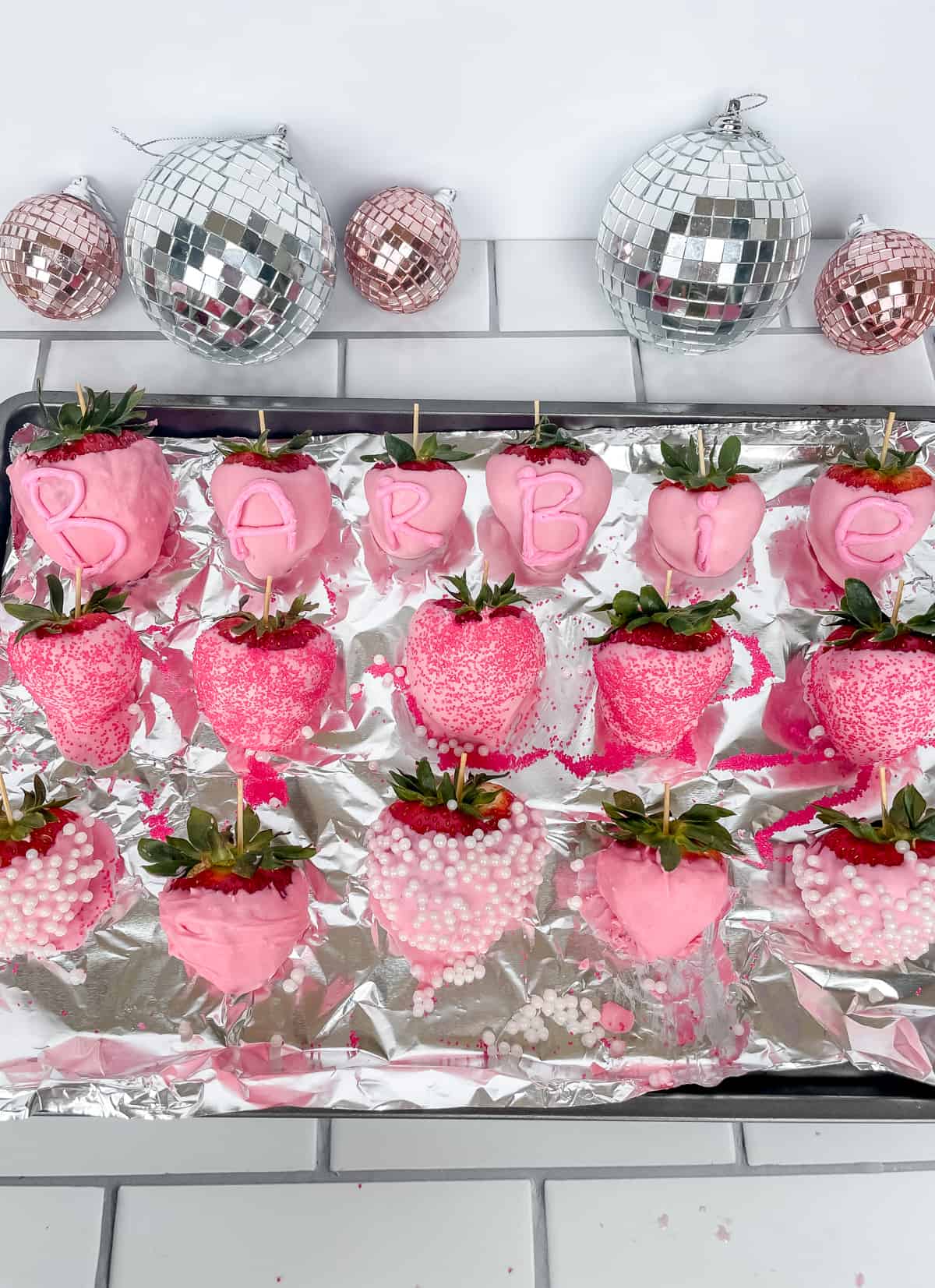 place strawberries on backing sheet and set in fridge for 15 mins until chocolate is dry 8