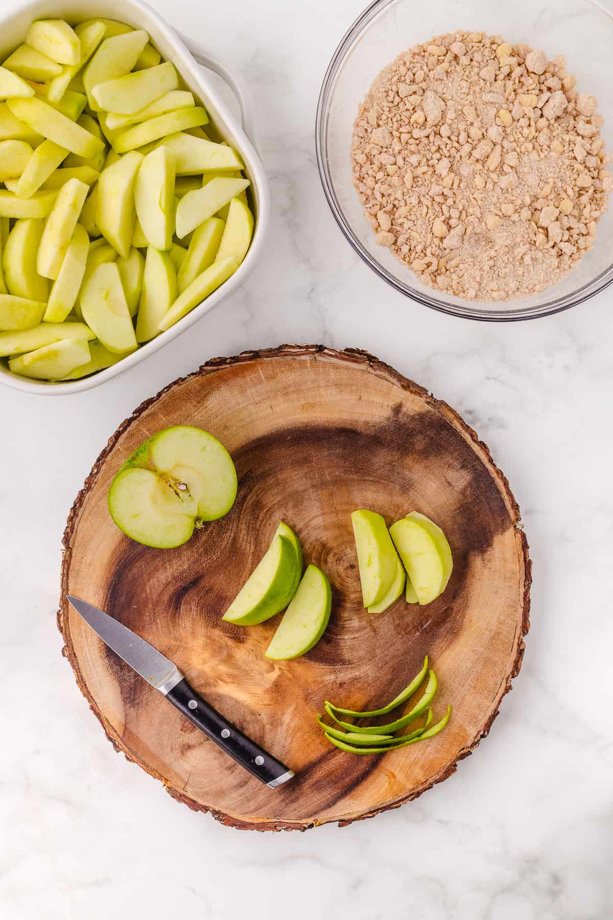 5 slice the apples on a cutting board
