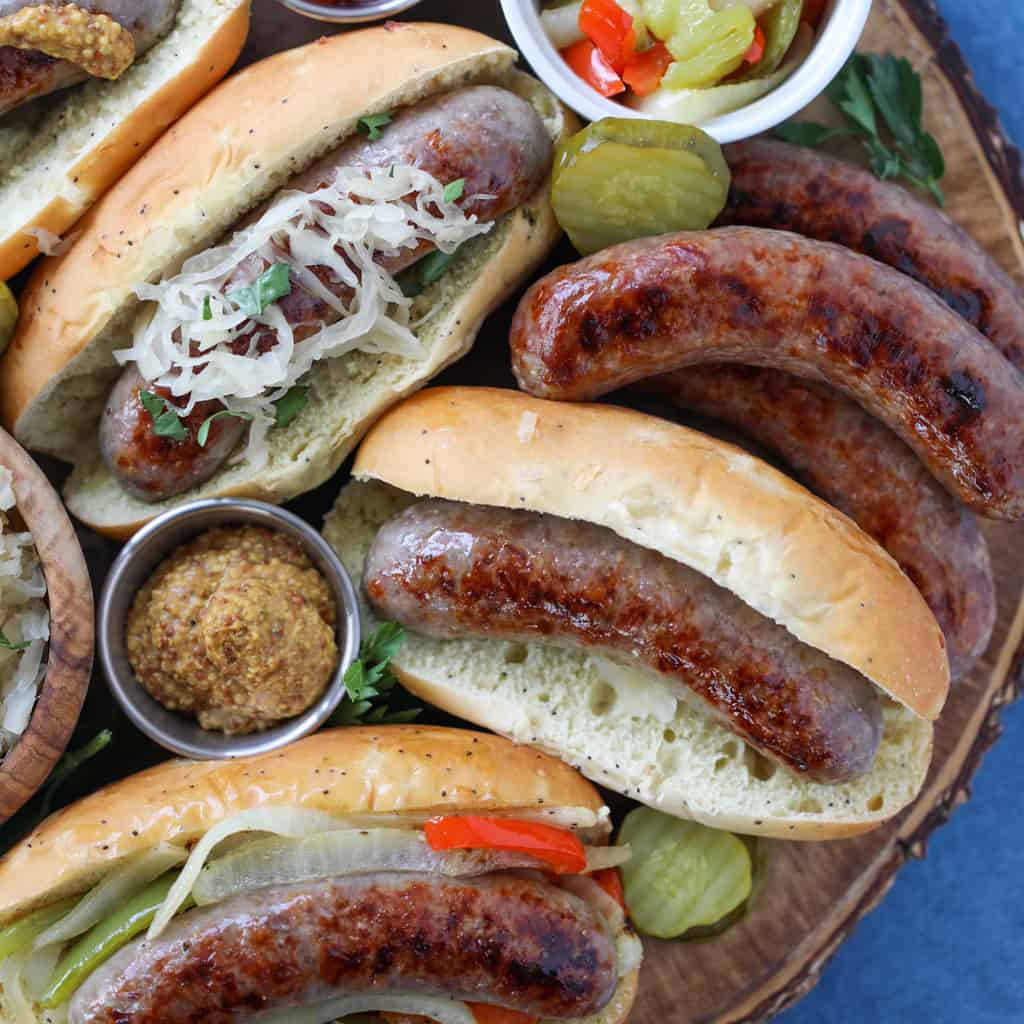 brats in oven recipe on a board