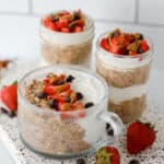 close up image of chocolate overnight oats in different sized storage jars