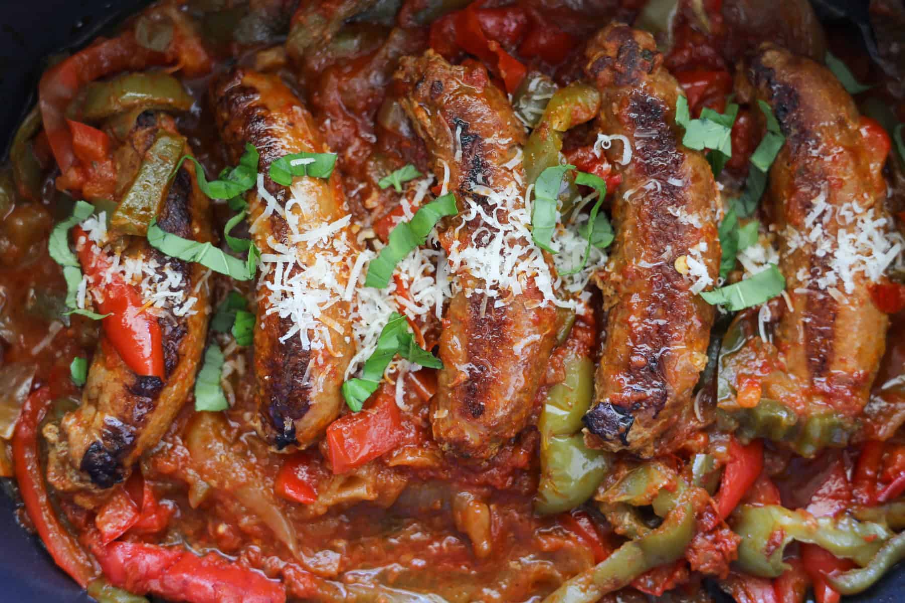 close up of chicken sausage peppers and onions in a row