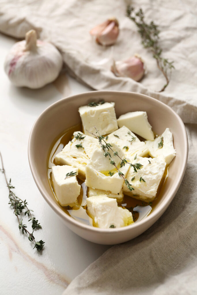 feta cheese cubes are a zero carb snack sitting on a white background