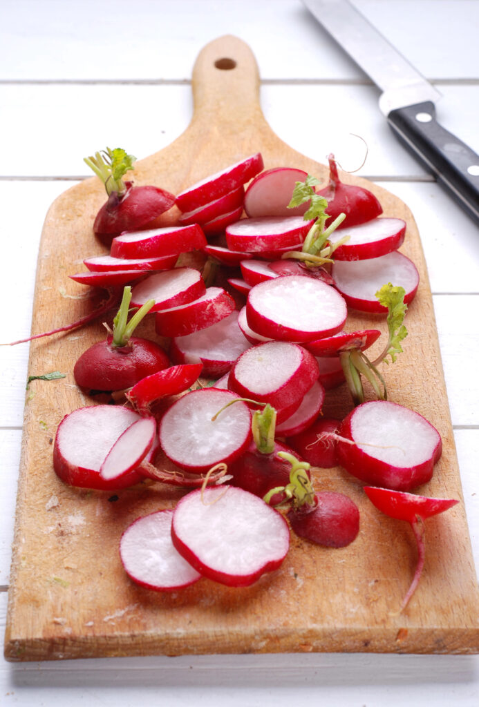 radishes on a cutting board 