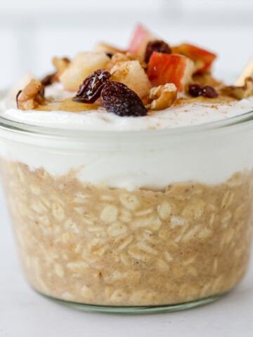 applesauce overnight oats with greek yogurt on top close up