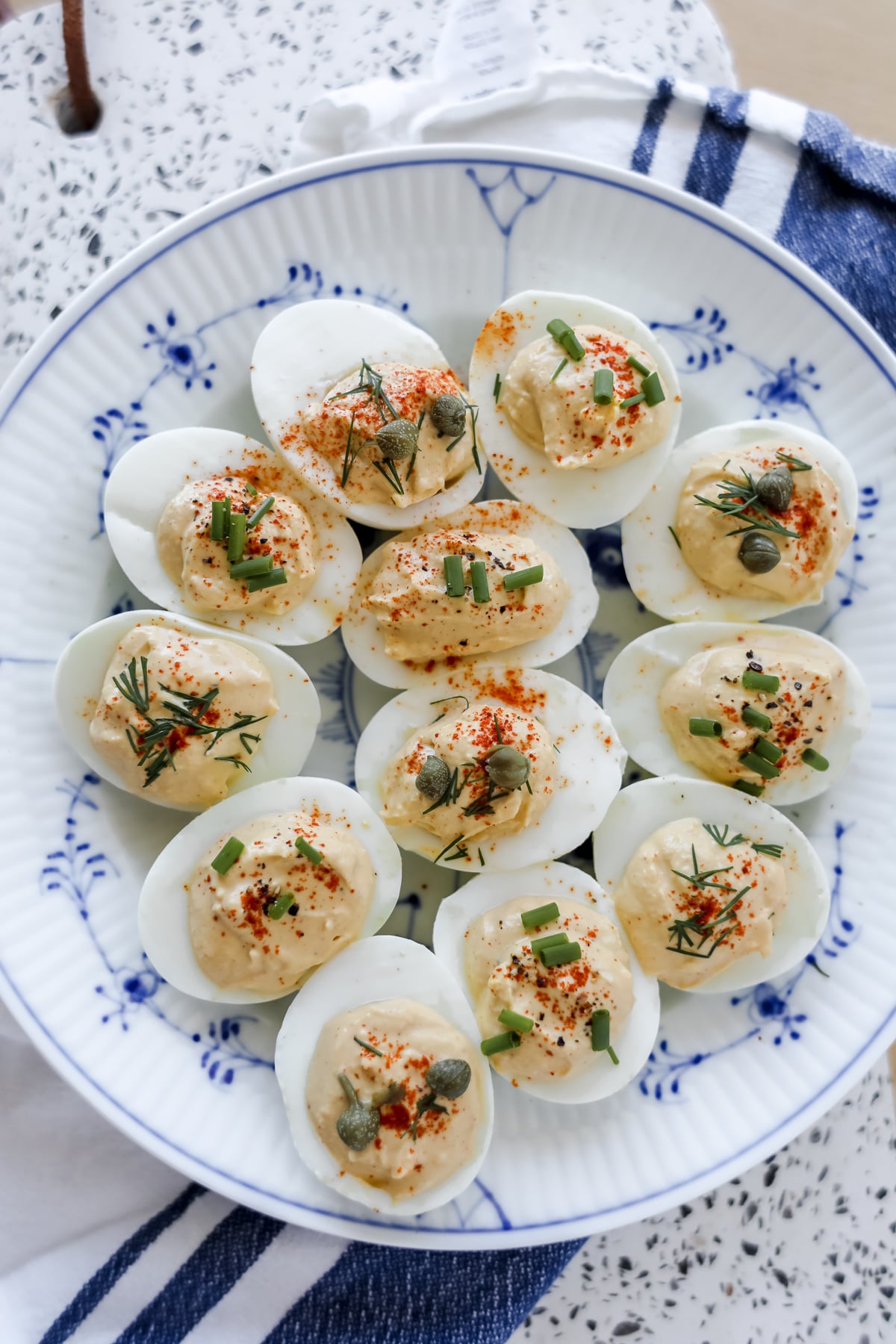 no mayo deviled eggs with greek yogurt on a plate with dill ready to eat