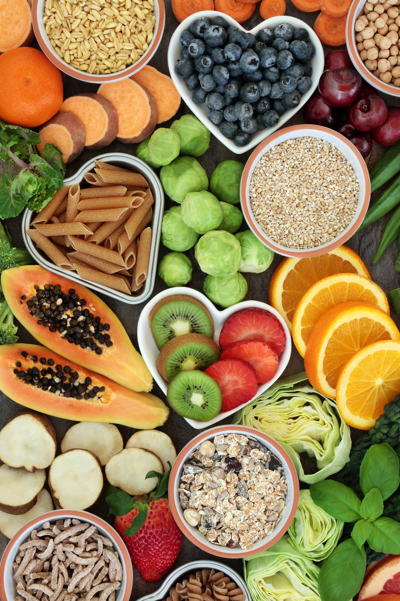 high fiber photo of fruits and veggies on a black board