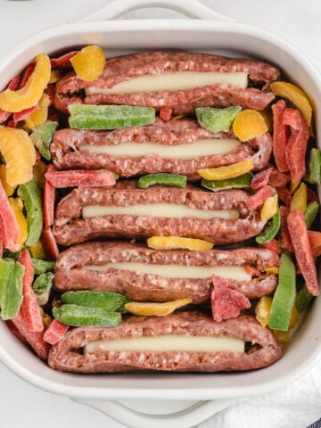 stuffed sausage assembled in a baking pan before cooking in the oven