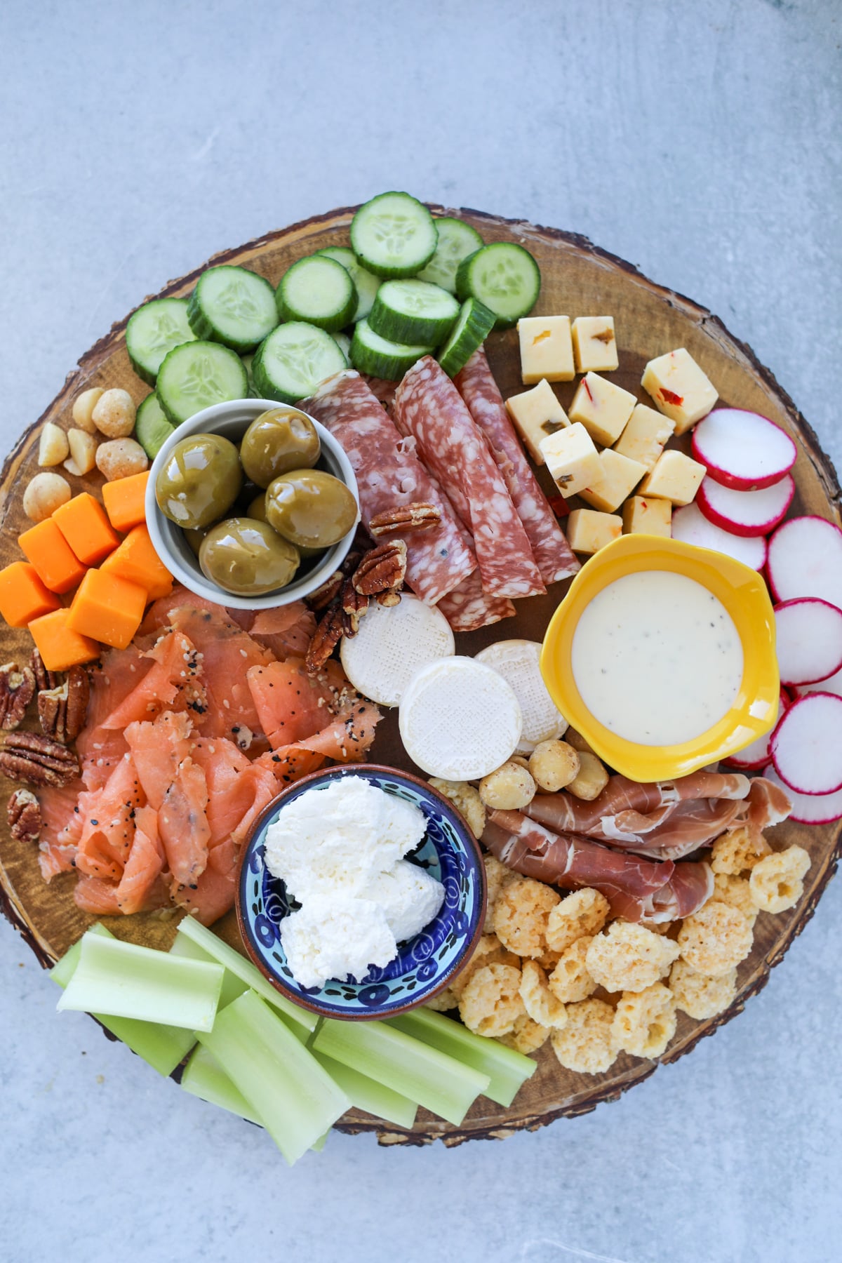 our no carb charcuterie board is keto low carb and carnivore and features a variety of meats cheese nuts and vegetables