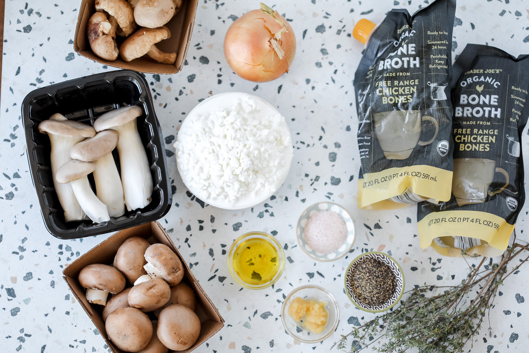high protein mushroom soup ingredients on a white cutting board