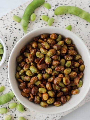 crispy air fryer edamame beans served in a bowl after being cooked in the air fryer