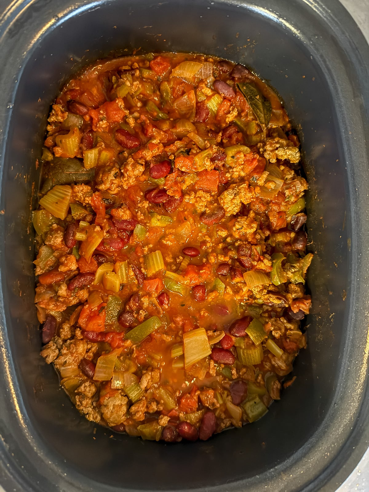 healthy slow cooker turkey chili in a crock pot